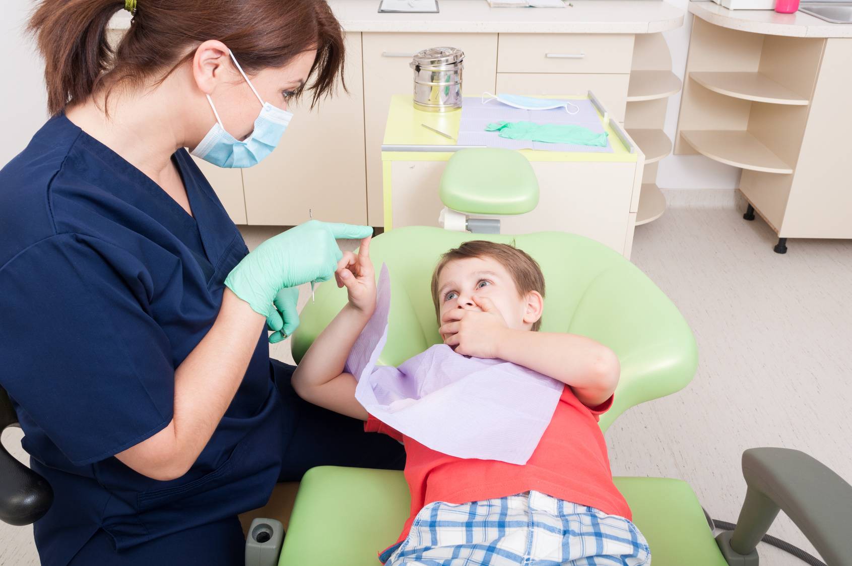 ребенок в стоматологическом кресле