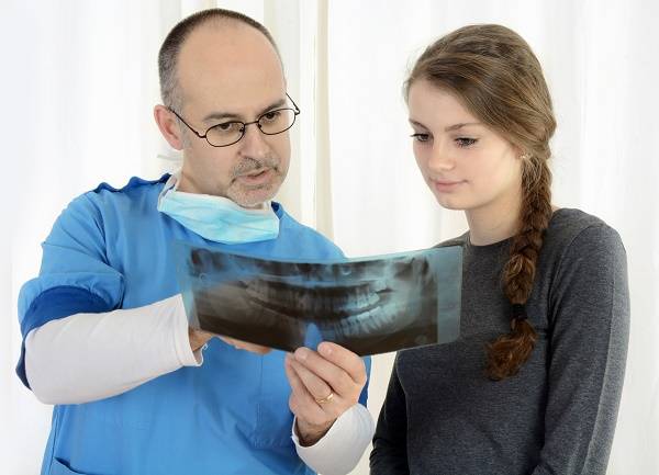 Рентген зуба при беременности: можно ли делать снимок на ранних сроках?